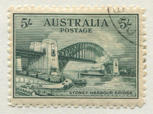 AUSTRALIA - Kangaroos - Collections & Accumulations: 1913-88 mostly used collection on Seven Seas album pages with Roos First Wmk to 1/-, Second Wmk to 5/-, Third Wmk to 10/- & £1 Grey, CofA 10/-, £1 & £2, KGV Heads complete (few Perf types misidentified), KGV commems complete incl. Kooka M/S (mint), 5/- Bridge CTO, KGVI Robes to £1 (2), Arms to £2, 1946 BCOF set, QEII £sd Navigators to £2, thereafter largely complete; condition of earlier issues a bit variable, otherwise mostly fine. (100s)