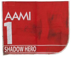 AAMI VICTORIA DERBY 2019, Horse No.1 (Barrier 9), SHADOW HERO, Jockey: J. Parr, The unique number 1 saddlecloth, signed by Joshua Parr accompanied by a letter of authenticity and limitation signed by Neil Wilson, CEO, Victoria Racing Club, Limited and the official AAMI Victoria Derby Day Racebook.