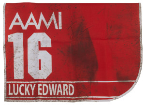 AAMI VICTORIA DERBY 2019 Horse No.16 (Barrier 5), LUCKY EDWARD, Jockey: Jack Hill, The unique number 16 saddlecloth, signed by Jack Hill, accompanied by a letter of authenticity and limitation signed by Neil Wilson, CEO, Victoria Racing Club, Limited and the official AAMI Victoria Derby Day Racebook.