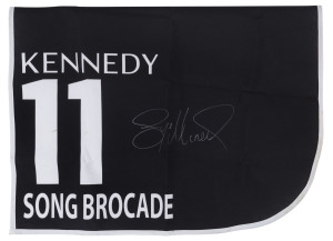 KENNEDY OAKS 2019 Horse No.11 (Barrier 8), SONG BROCADE, Jockey: Jye McNeil, The unique number 11 saddlecloth, signed by Jye McNeil accompanied by a letter of authenticity and limitation signed by Neil Wilson, CEO, Victoria Racing Club, Limited and the official Kennedy Oaks Day Racebook.