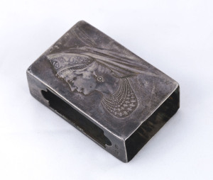 A Russian silver matchbox holder with profile portrait of ALEXANDRA FEODOROVNA (1872-1918) Empress Consort of Russia, wife of Tsar Nicholas II. The last Tsarina of Russia, known for her notorious friendship with the Russian mystic Rasputin. Stamped "84" with Cyrillic maker's mark. 6cm high, 46 grams