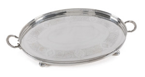 An English sterling silver oval serving tray by Walker & Hall, Sheffield, circa 1900, 56cm across the handles, 2150 grams