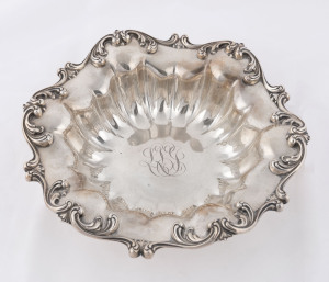 An American silver circular bowl with scrolling rim and engraved script initials, by Frank M. Whiting & Co., circa 1900, 26cm diameter, 410 grams.