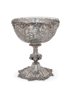 A Victorian sterling silver pierced goblet with grapevine rim and original glass liner, London, circa 1857, 17cm high, 14cm diameter, 400 grams.
