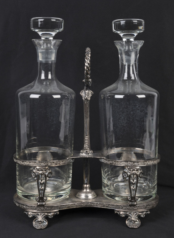 An English silver plated two bottle tantalus by Walker & Hall, circa 1900, decanters later and not associated, 31cm high