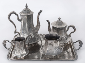 A five piece engraved silver plated tea service, late 19th century, the coffee pot 28cm high