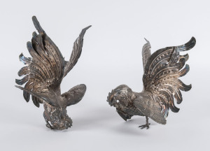 A pair of fighting cockerel silver plated statues, mid 20th century, the larger 28cm high