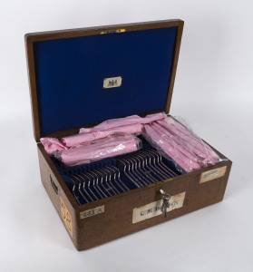 A sterling silver flatware service (incomplete), Albany pattern; hallmarked Sheffield 1901 by John Round and comprising one soup, two basting spoons, eleven tablespoons, 11 dessert spoons, twelve table forks and 11 dessert forks. The knives, with original ivory handles comprise of twelve table, nine bread & butter, 1 carving, steel, and two carving forks. All contained in the original box with family monogram and various labels; the knife box is missing. Approx. 3,400 grams.