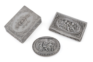 Three Continental silver boxes with repoussé decoration, 19th and early 20th century, the largest 8.5cm across, 190 grams total