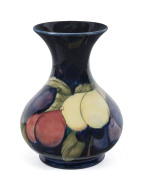 MOORCROFT "Wisteria" baluster shaped vase, circa 1930, impressed stamp "Moorcroft, Made In England", 15cm high