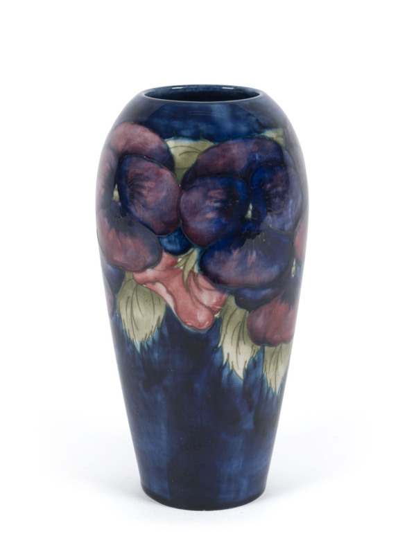 MOORCROFT "Pansy" pattern vase on blue ground, circa 1930s, impressed "Moorcroft, Made in England", 18.5cm high