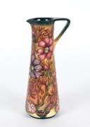 MOORCROFT "Cosmos" pattern ewer by Rachel Bishop, circa 2001, stamped "Moorcroft, Made In England, Stock On Trent, 2000", 24.5cm high