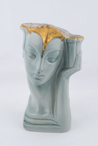 An Art Deco figural porcelain vase, Austrian or German, circa 1925, 23cm high