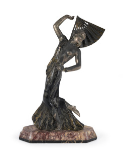 A French Art Deco statue of a dancing lady, patinated spelter and marble, circa 1935, 49cm high