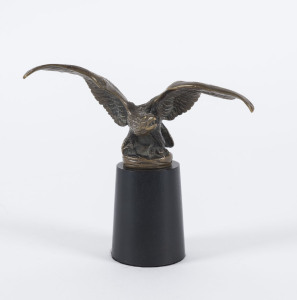 A French "Spread Eagle" car mascot by G. Paillet for A E Lejeune on later ebonized timber stand, 1920s, 13.5cm wingspan