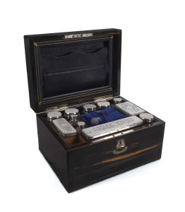 A ladies travelling box, coromandel with mother of pearl inlay, interior fitted with velvet lined jewellery compartments and silver plated bottles, 19th century