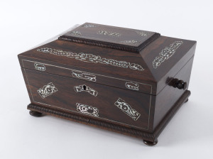 An English ladies workbox, rosewood with mother of pearl inlay, circa 1840, interior fitted with numerous silk lined compartments, 17cm high, 30cm wide, 22.5cm deep