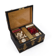 An impressive antique games box, coromandel and satinwood with brass fittings. Interior fitted with compartments, lift out tray and double-sided games board. Includes a fine array of carved bone and ivory gaming pieces comprising chess, draughts and backg - 2