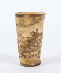 A Georgian carved horn cup with hunting scene, late 18th century, ​12.5cm high