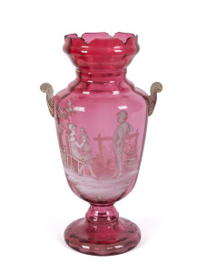 A Mary Gregory ruby glass mantel vase, 19th century, 38cm high