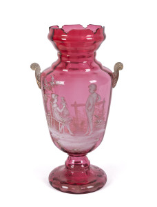 A Mary Gregory ruby glass mantel vase, 19th century, ​38cm high