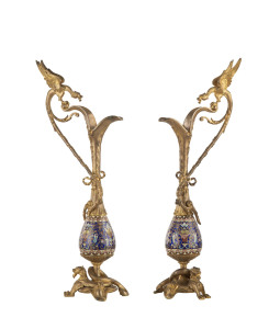A pair of French ornamental ewers, champleve enamel and gilded bronze, 19th century, 52cm high