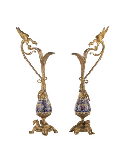 A pair of French ornamental ewers, champleve enamel and gilded bronze, 19th century, ​52cm high