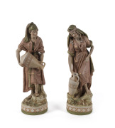 ROYAL DUX pair of Austrian porcelain statues of the water carriers, early 20th century, pink triangle mark impressed "Royal Dux Bohemia", 44cm high
