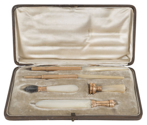 A ladies five piece writing set in box, 9ct rose gold with mother of pearl handles, 19th century, the box 20cm across