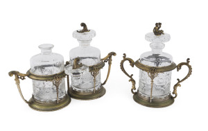 A French decanter set in gilt bronze stands, 19th century, 24cm high