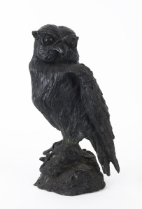 A cast bronze owl statue, 19th/20th century, 39cm high