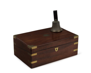 A Victorian mahogany writing box and antique shop bell, 19th century, the box 13.5cm high, 35cm wide, 23cm deep