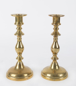 A pair of English antique brass candlesticks, 19th century, 24cm high