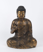 A Chinese seated Buddha, carved and gilded wood, 19th/20th century, ​39cm high