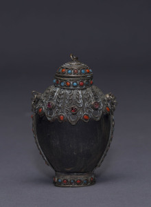 A Sino-Tibetan snuff bottle, horn and silver with semi-precious stones, 19th century, 8.5cm