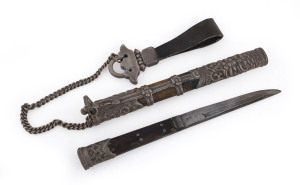 A Tibetan dagger, finely worked silver mounts on wood and steel, 19th century, ​25cm in scabbard