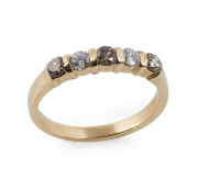 A gold ring set with row of alternating brilliant cut champagne and white diamonds, stamped "375", 2.6 grams