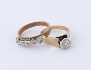Two gold rings set with diamonds, both stamped "9ct", 5.9 grams total