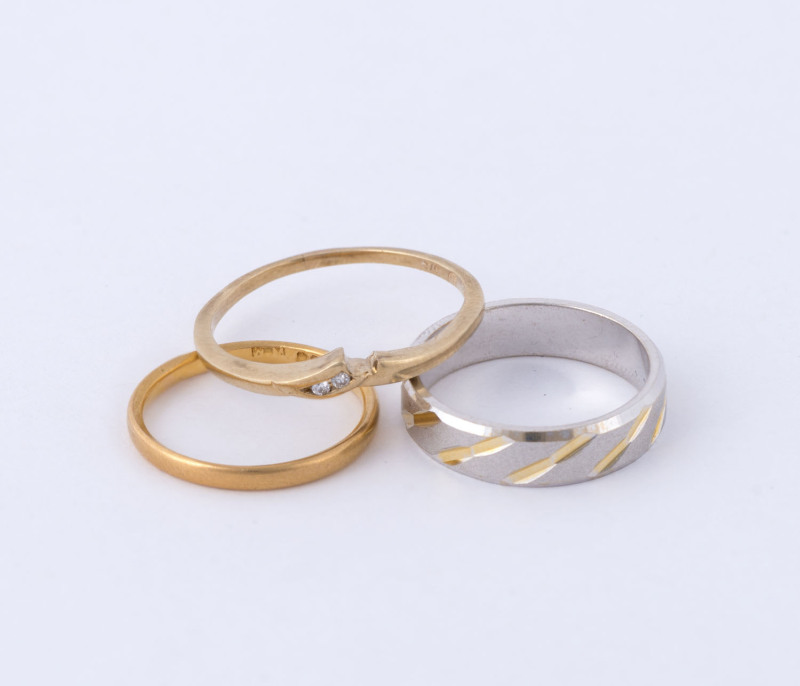 A 22ct gold ring (1.6 grams), an 18ct white gold ring (3.8 grams) and a 9ct gold and diamond ring (1.4 grams)