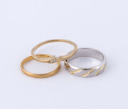 A 22ct gold ring (1.6 grams), an 18ct white gold ring (3.8 grams) and a 9ct gold and diamond ring (1.4 grams)