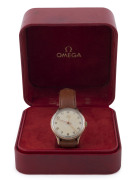 An OMEGA Gents manual wristwatch in rose gold case, with original omega box, circa 1950s