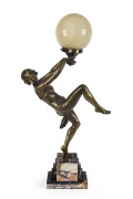 An Art Deco lamp of a dancing nude, gilt metal with spherical glass shade and marble base, circa 1930, ​73cm high