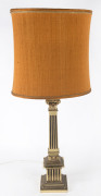 An Italian table lamp and shade with square Corinthian column brass base, circa 1950, ​94cm high