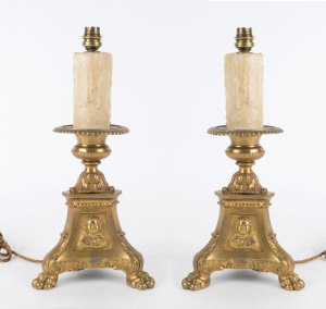 A pair of French table lamps in the form of baronial candle stands, early 20th century, 40cm high