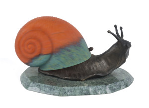 A snail lamp, bronze with coloured glass on green marble base, 20th century, 27cm long