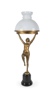 A French Art Deco figural lamp, gilt metal with milk glass shade on black marble base, circa 1930, 75cm high