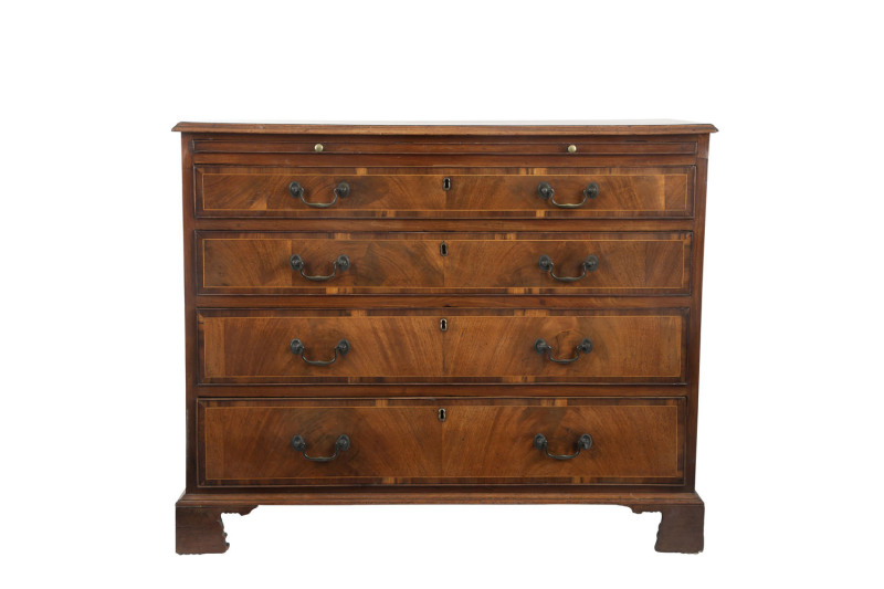 A Georgian gentleman's chest of four drawers with brushing slide, mahogany and walnut with string inlay, late 18th century, ​86cm high, 105cm wide, 50cm deep