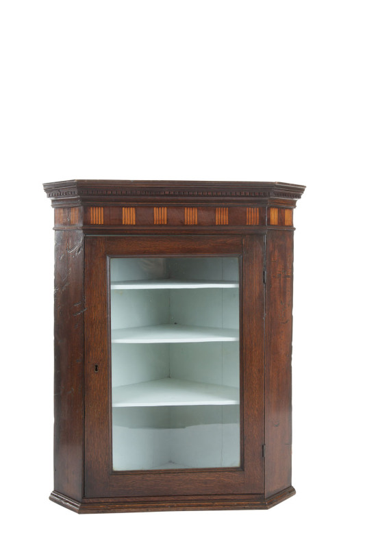 A Georgian corner cabinet, oak and mahogany with satinwood inlay, circa 1800, ​96cm high, 79cm wide, 44cm deep