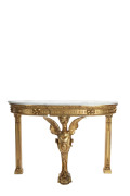 A Regency console table with gilded carved griffin motif and marble top, circa 1820, 92cm high, 134cm wide, 46cm deep