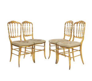 A set of four French dining chairs, turned and gilded timber, early to mid 19th century